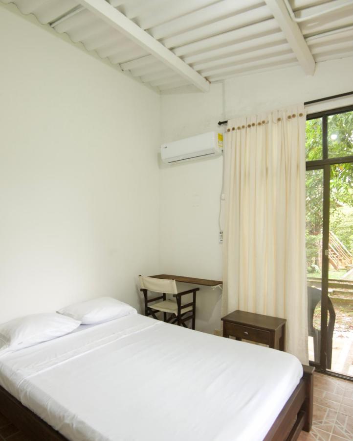 Hostal Suna Vito Puerto Asis Bagian luar foto