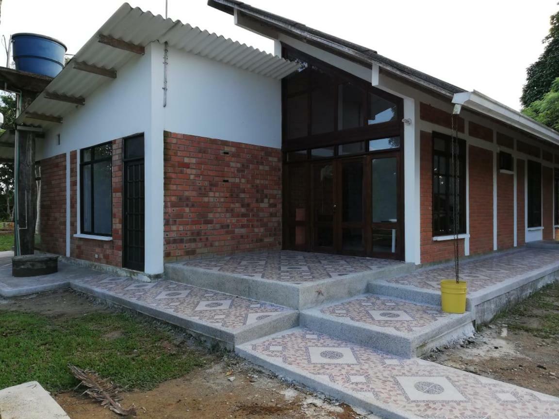 Hostal Suna Vito Puerto Asis Bagian luar foto
