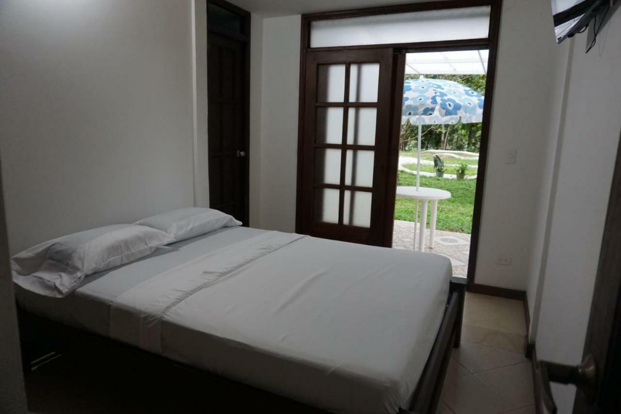 Hostal Suna Vito Puerto Asis Bagian luar foto